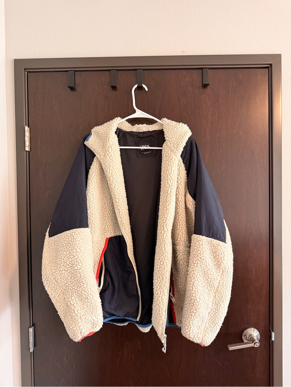 Zara Cream Sherpa Jacket with Navy Panels and Red Accents